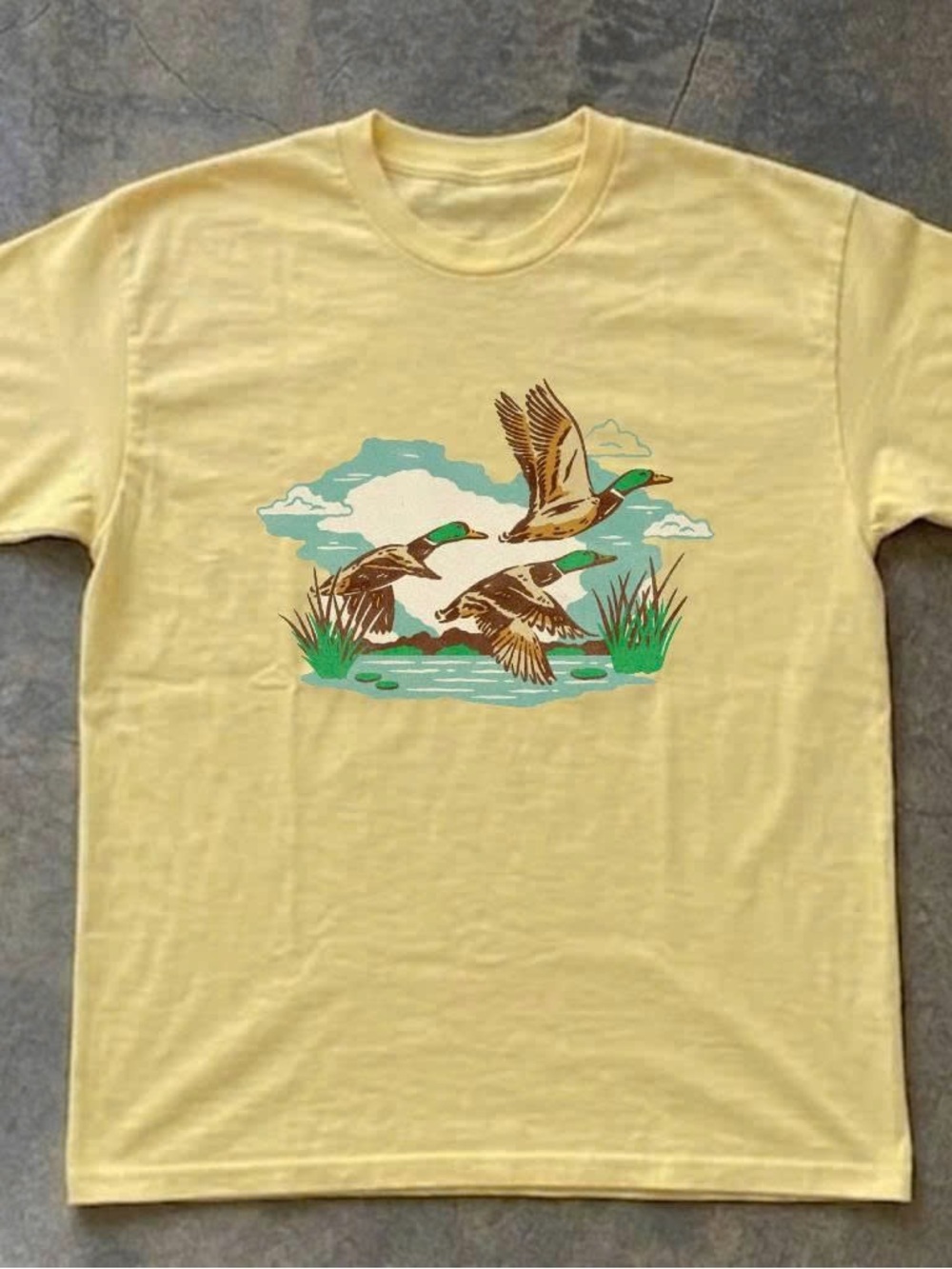 Yellow Short Sleeve Tee with Flying Mallard Graphic